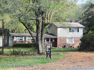 13064 Yellow Bluff Road Jacksonville, FL 32226 - Photo 1 of 1 front view of a house with a yard