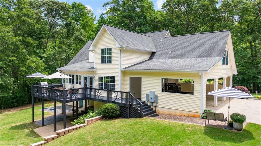 128 Byrom Road Senoia, GA 30276 - Photo 61 of 83 a view of a house with a yard and furniture