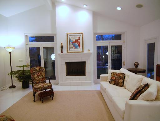 128 Fairbank Road Riverside, IL 60546 - Photo 4 of 11 a living room with furniture and a fireplace