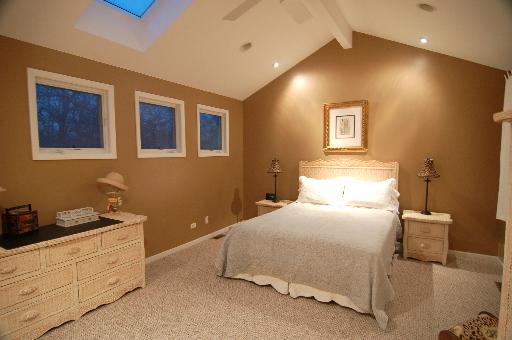 128 Fairbank Road Riverside, IL 60546 - Photo 9 of 11 a bedroom with a bed and a night stand