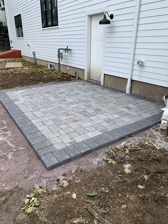 10 Lincoln Street, Unit 1 Natick, MA 01760 - Photo 5 of 5 a view of a backyard of the house