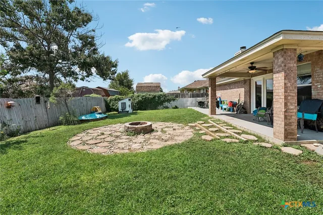 a front view of house with yard