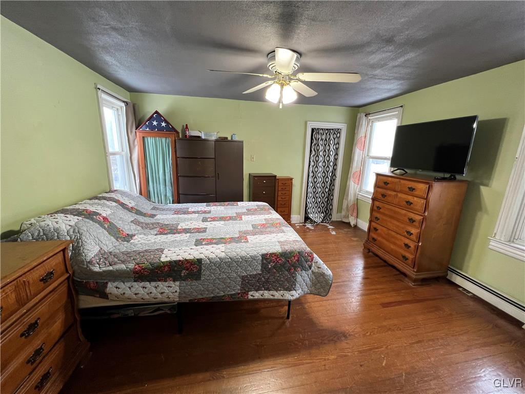 898 Bangor Road Nazareth, PA 18064 - Photo 11 of 16 a bedroom with a bed and a flat screen tv