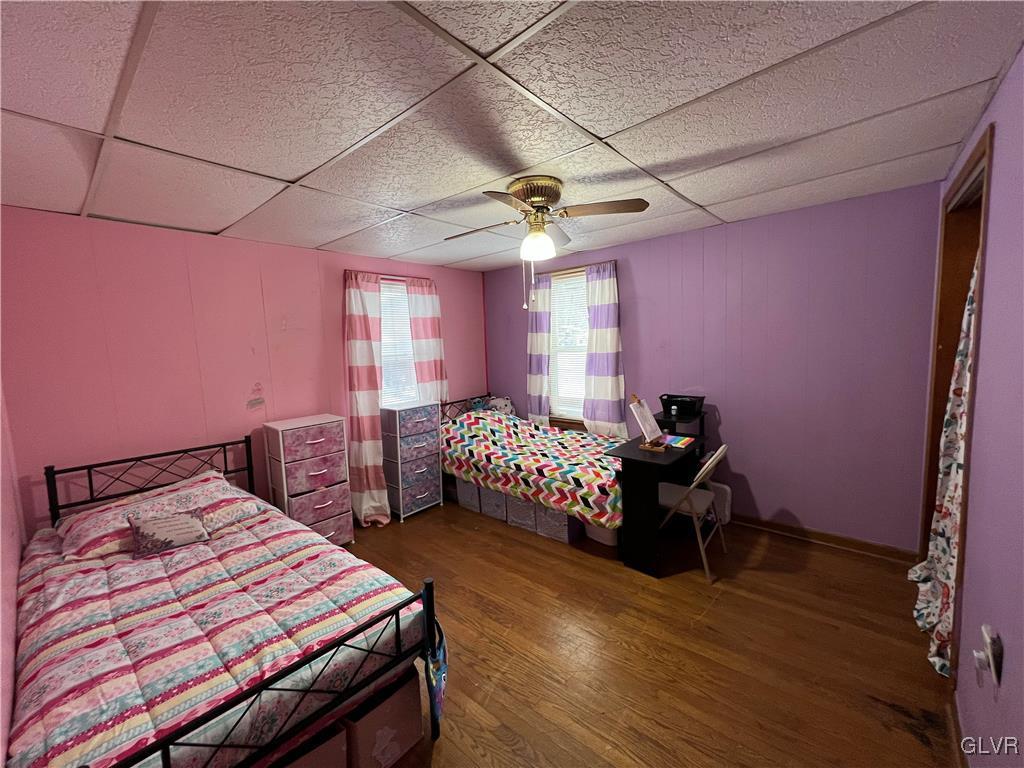 898 Bangor Road Nazareth, PA 18064 - Photo 15 of 16 a bedroom with a bed and a chandelier