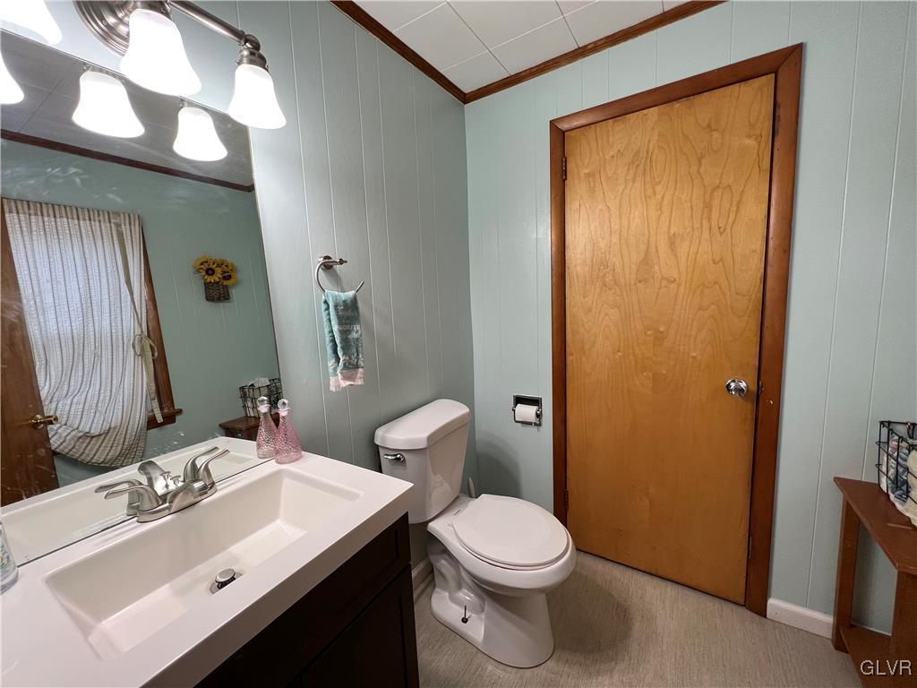 898 Bangor Road Nazareth, PA 18064 - Photo 10 of 16 a bathroom with a sink mirror vanity and toilet