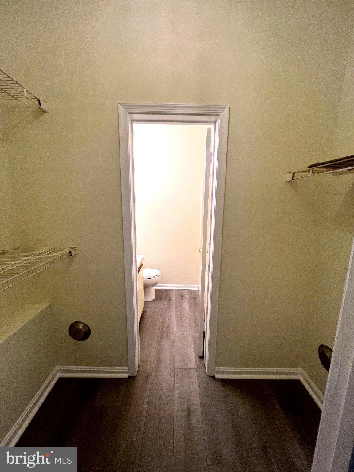 604 Moonglow Road, Unit 102 Odenton, MD 21113 - Photo 27 of 27 Spacious closet with adjoining bath access.
