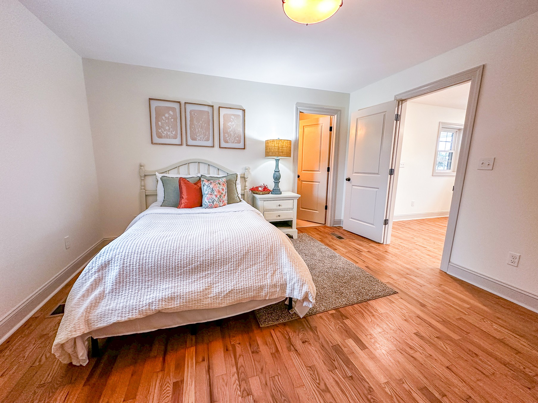 116 Smith Circle Loretto, TN 38469 - Photo 15 of 23 a bedroom with a bed and wooden floor