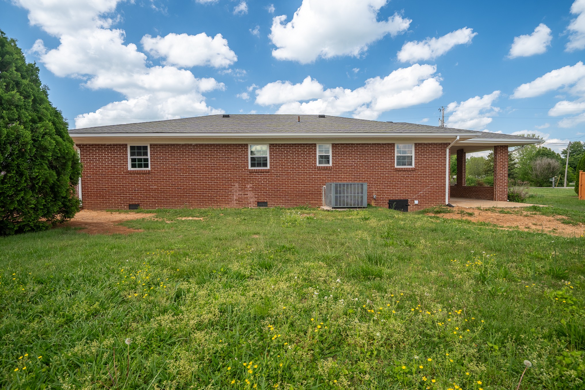 116 Smith Circle Loretto, TN 38469 - Photo 22 of 23 a view of a house with a yard