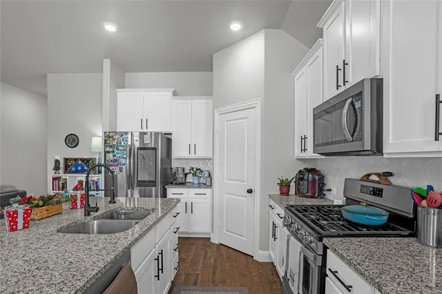 a view of a dining room with furniture