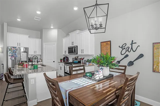 a view of an house with backyard and pool