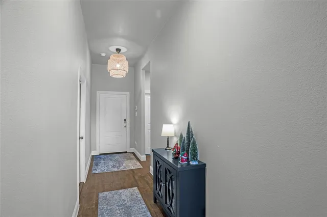 a view of a hallway with entryway