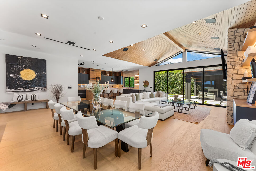 13463 Chandler Boulevard Sherman Oaks, CA 91401 - Photo 13 of 38 a living room with furniture and a large window