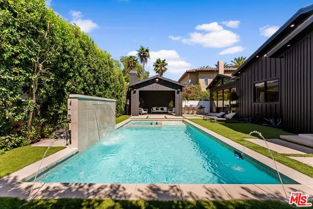 a view of a house with a swimming pool