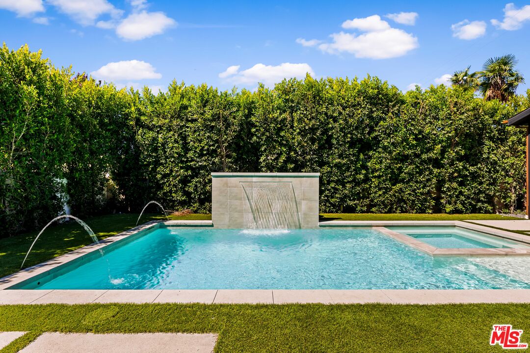 13463 Chandler Boulevard Sherman Oaks, CA 91401 - Photo 31 of 38 a view of a yard with an outdoor space