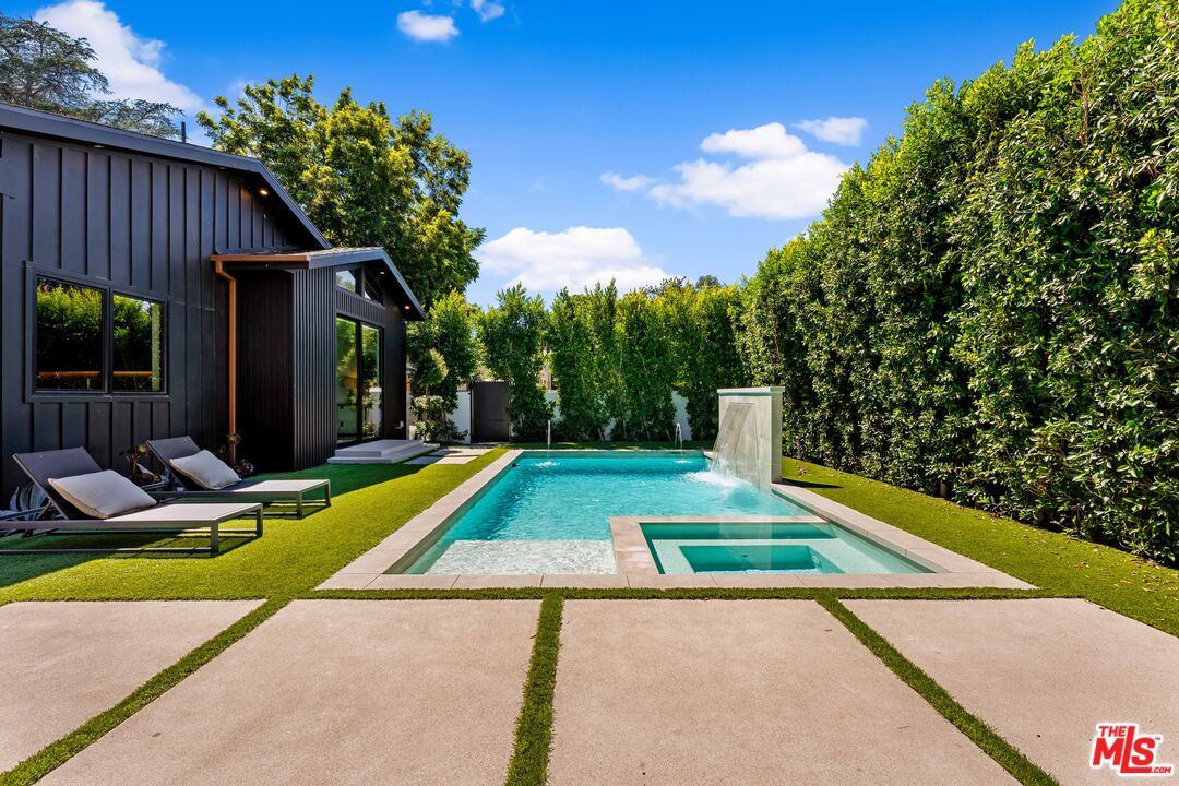 13463 Chandler Boulevard Sherman Oaks, CA 91401 - Photo 32 of 38 a view of an outdoor space with pool and furniture