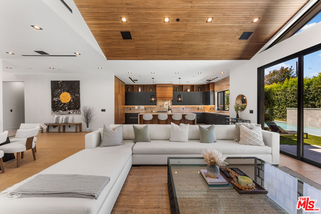 13463 Chandler Boulevard Sherman Oaks, CA 91401 - Photo 7 of 38 a living room with furniture and a large window