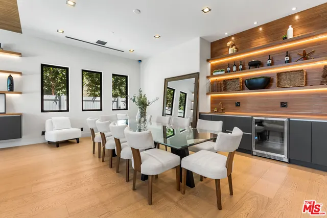 a large living room with furniture