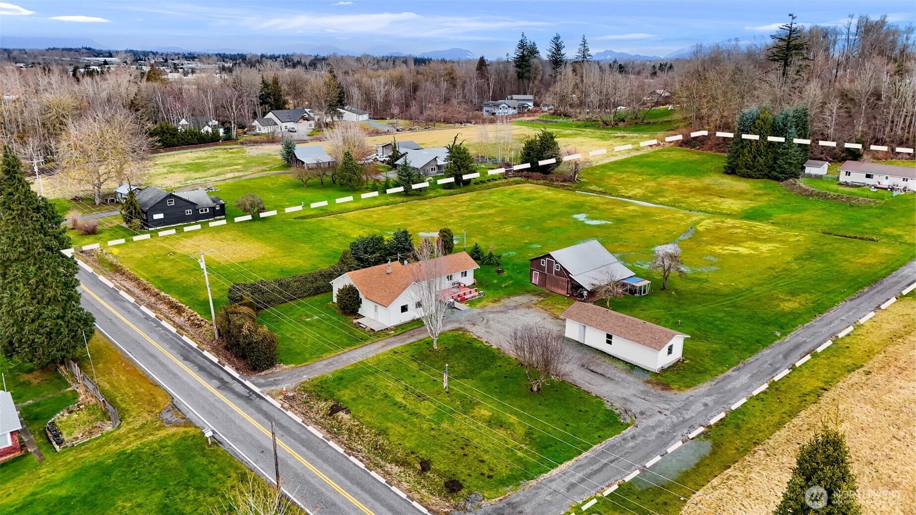 4610 Curtis Road Bellingham, WA 98226 - Photo 19 of 34 an aerial view of a house with outdoor space swimming pool