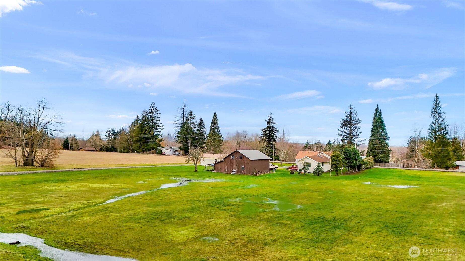 4610 Curtis Road Bellingham, WA 98226 - Photo 32 of 34 a view of yard with swimming pool and green space