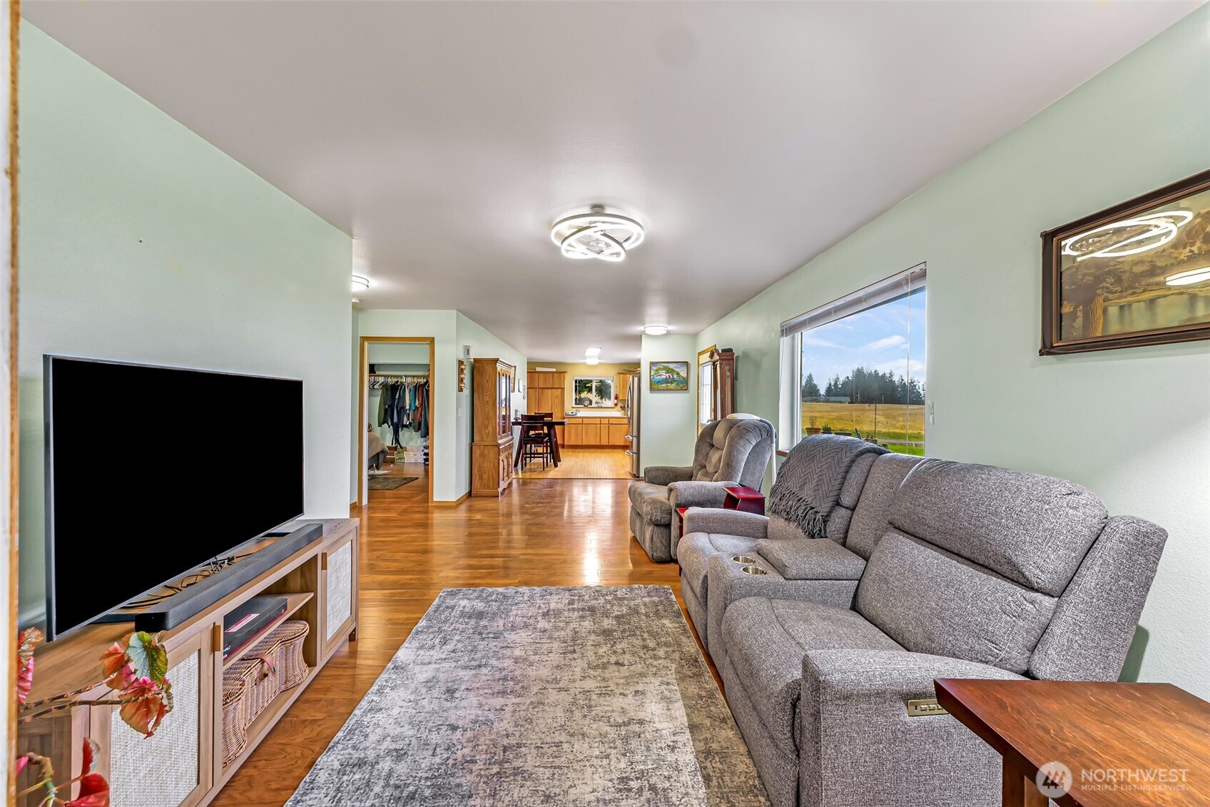 4610 Curtis Road Bellingham, WA 98226 - Photo 8 of 34 a living room with furniture and a flat screen tv