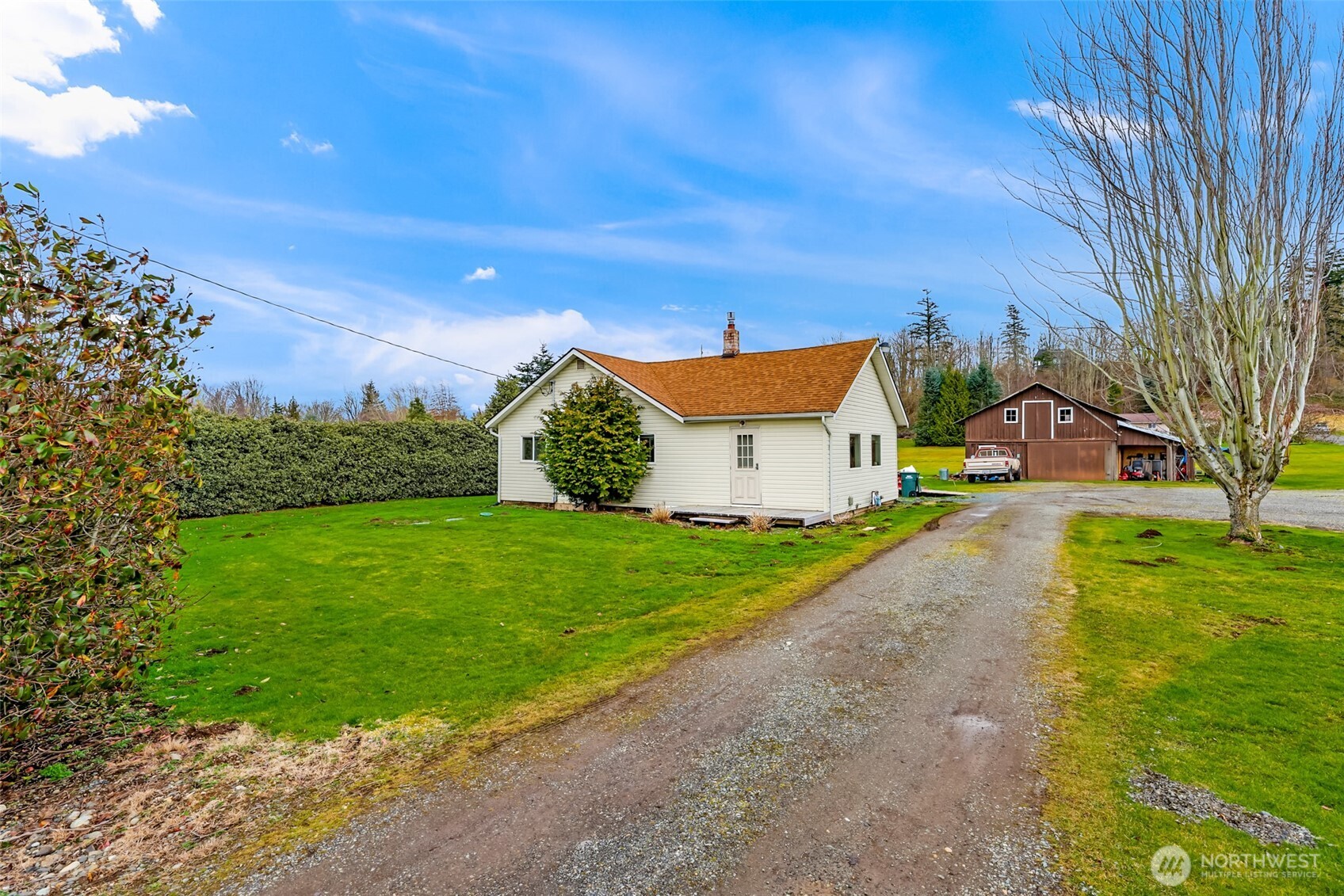 4610 Curtis Road Bellingham, WA 98226 - Photo 9 of 34 a view of a back yard of the house with a yard
