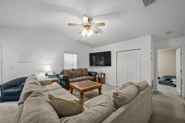 a bedroom with a bed and a walk in closet
