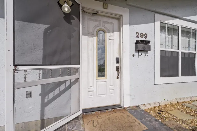 a very nice looking dining room with furniture