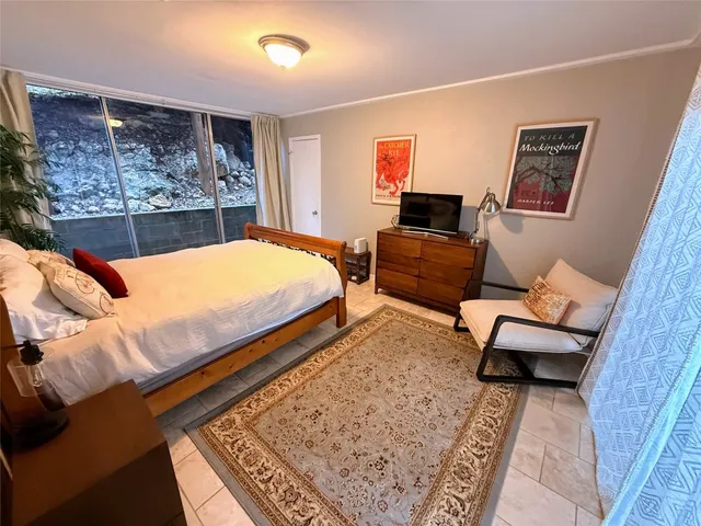 a bedroom with furniture and a couch