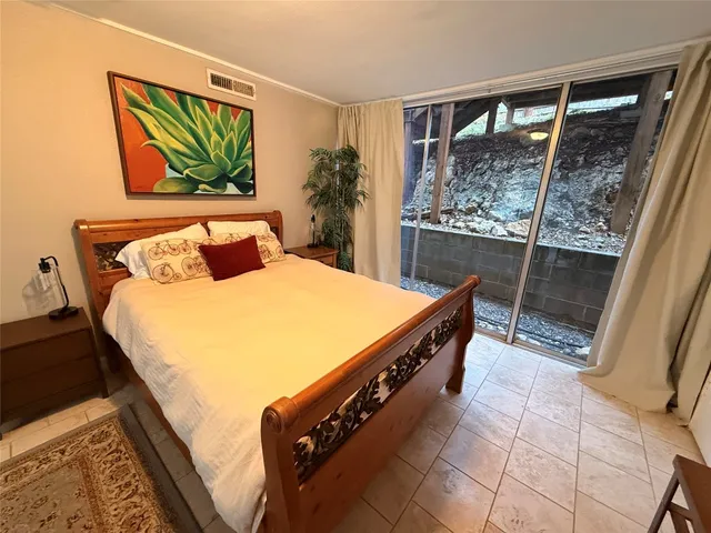 a room with a bed and a window