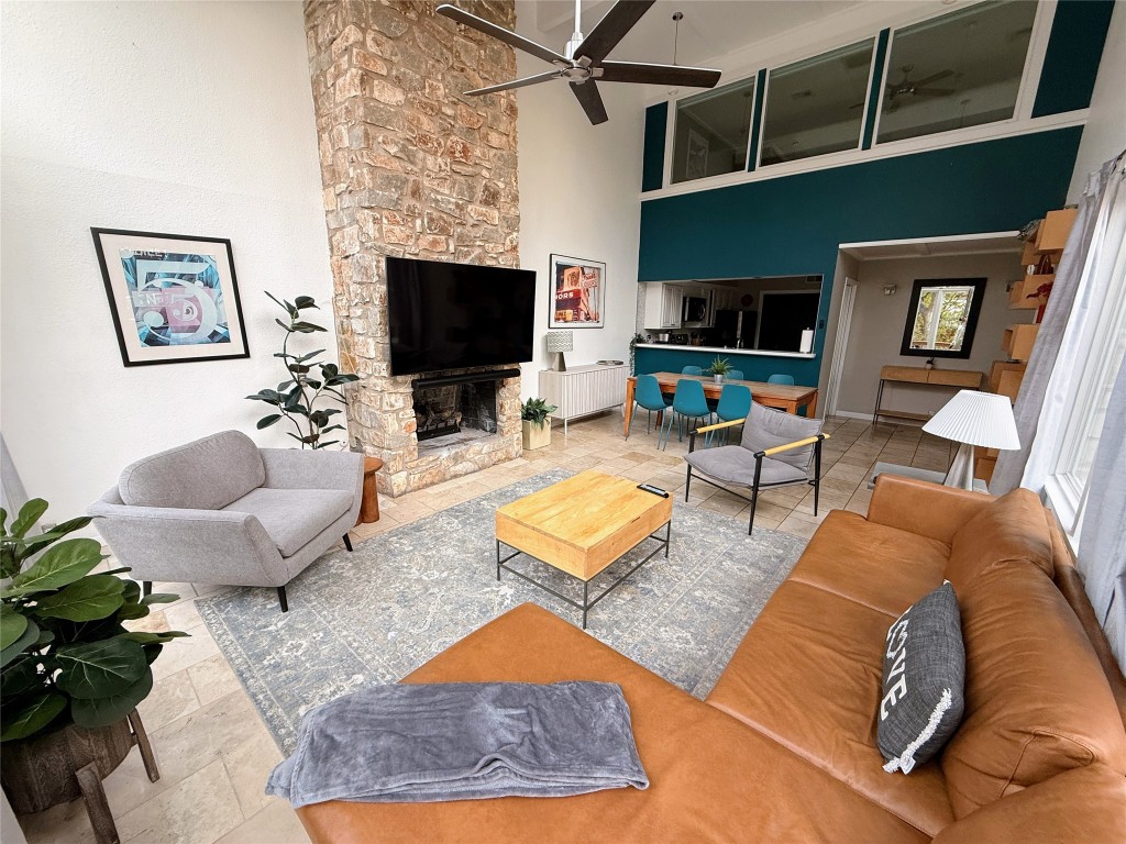 Undisclosed Address Austin, TX 78746 - Photo 8 of 26 a living room with furniture and a flat screen tv