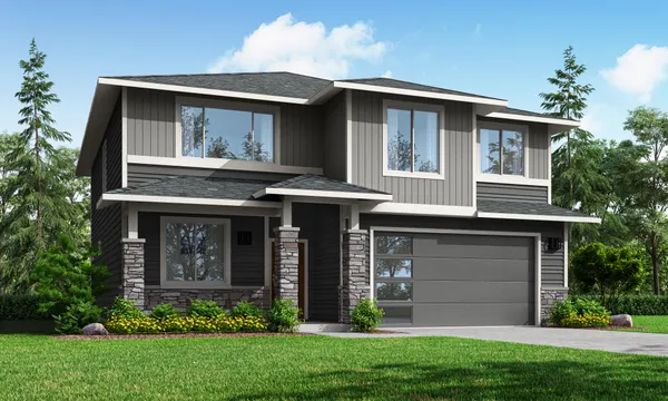 front view of a house with a yard