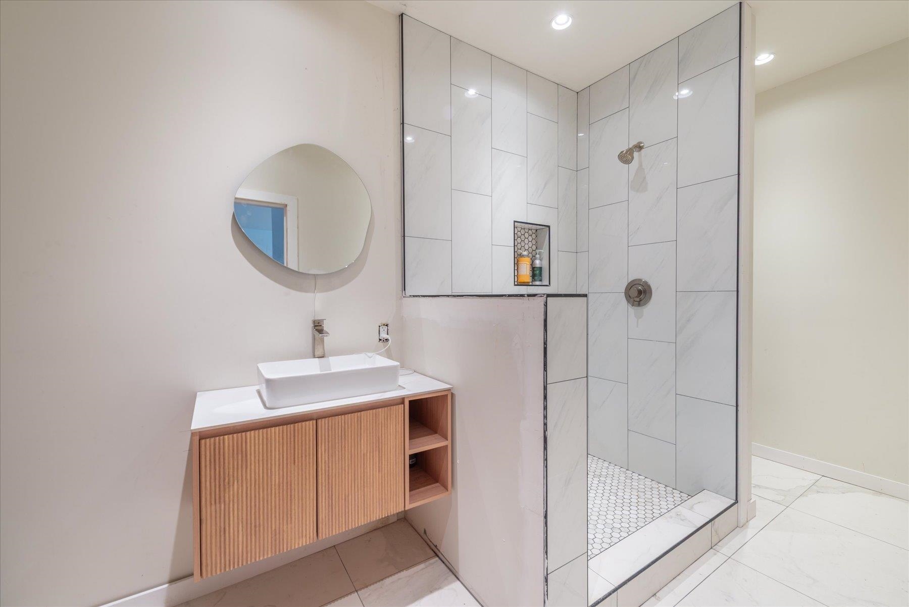 804 Fiberboard Road Sierraville, CA 96126 - Photo 24 of 28 a bathroom with a mirror a sink and a mirror