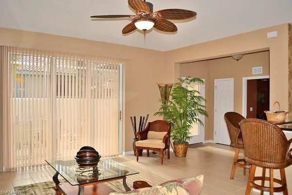 a living room with furniture and a window
