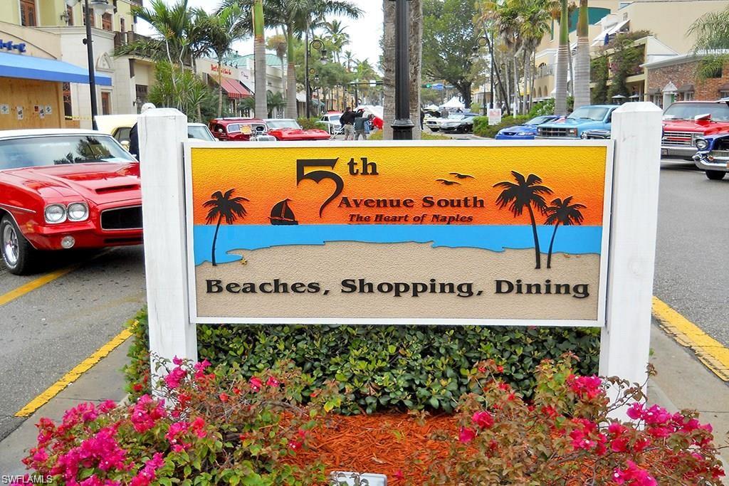 4007 Recreation Lane Naples, FL 34116 - Photo 18 of 24 a sign on the side of a building