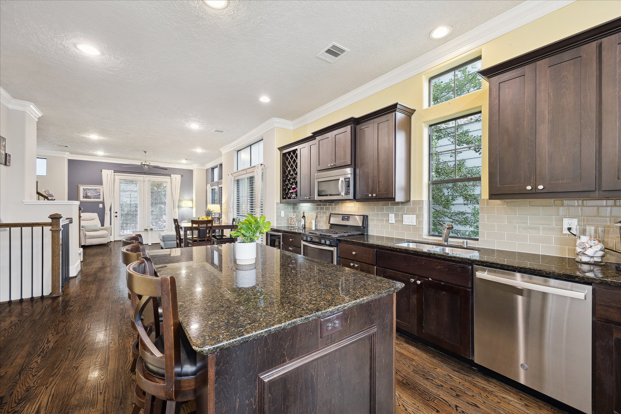 1110 West 25th Street Houston, TX 77008 - Photo 11 of 40 This light-filled, open-concept kitchen is designed to bring people together and make everyday living feel effortless. Flowing seamlessly into the dining and living areas, this kitchen truly serves as the heart of the home—inviting, functional, and perfectly suited for modern living buyers will love.