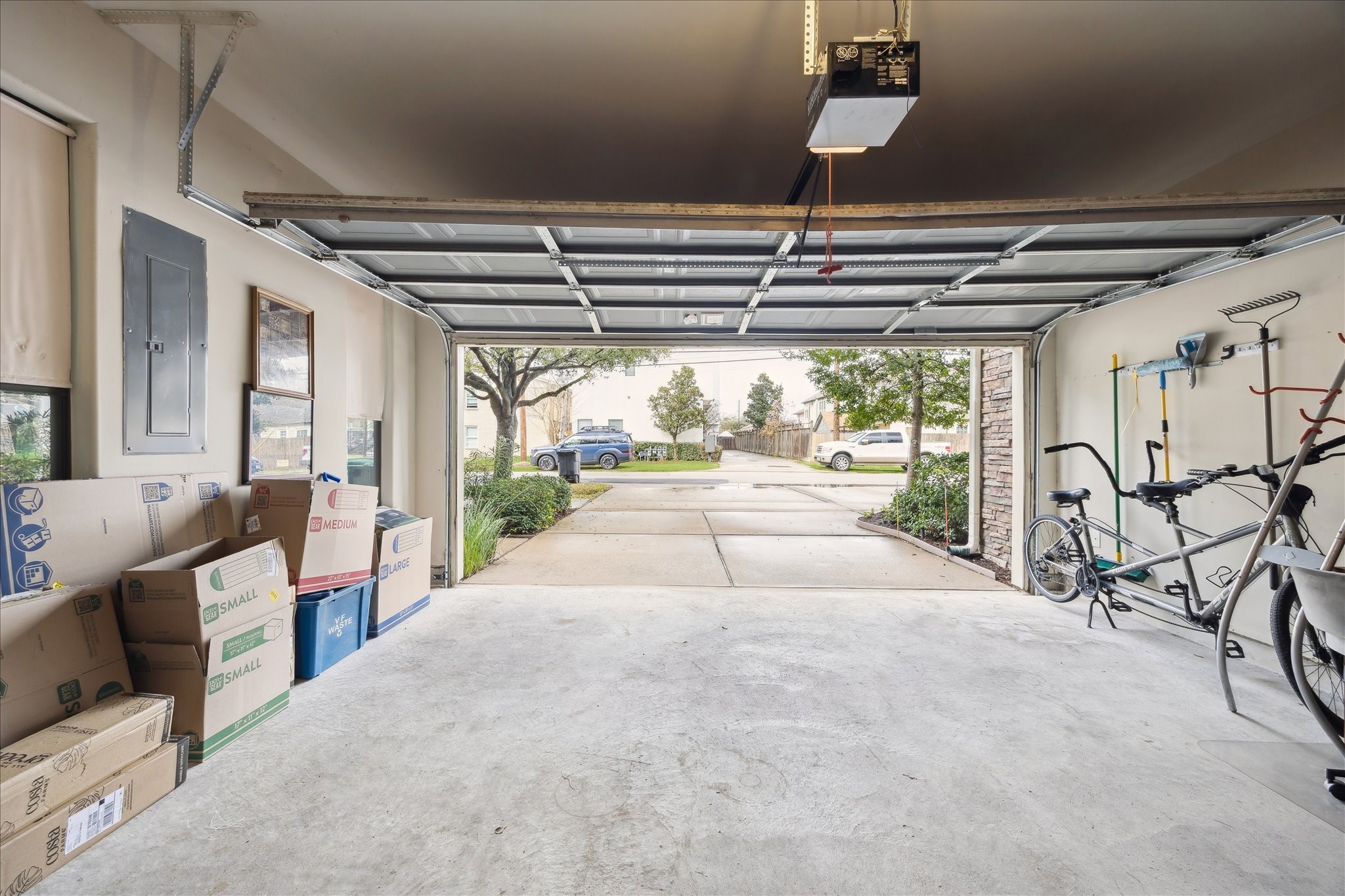 1110 West 25th Street Houston, TX 77008 - Photo 25 of 40 This private two-car garage with its own dedicated driveway is a rare and valuable feature that adds both convenience and peace of mind. The spacious garage easily accommodates two vehicles with room to spare for storage or bikes, while the private driveway offers additional parking—perfect for guests or everyday ease. With direct access and a quiet, tucked-away feel, this setup provides the kind of functionality and privacy buyers truly appreciate, making city living effortless and stres