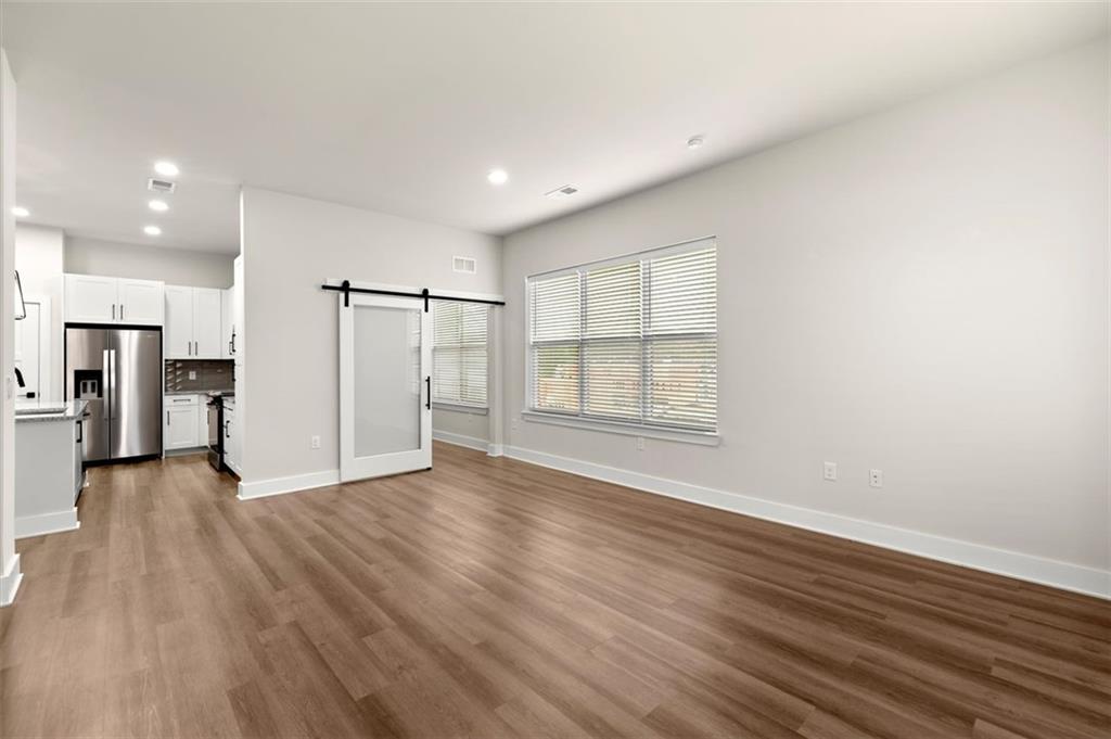 2648 Sandy Plains Road, Unit 301 Marietta, GA 30062 - Photo 12 of 46 a view of an empty room with a window