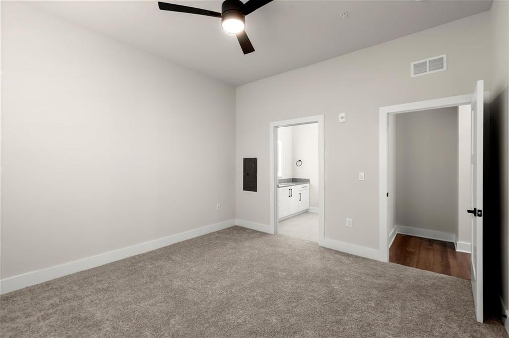 2648 Sandy Plains Road, Unit 301 Marietta, GA 30062 - Photo 20 of 46 an empty room with view of bathroom