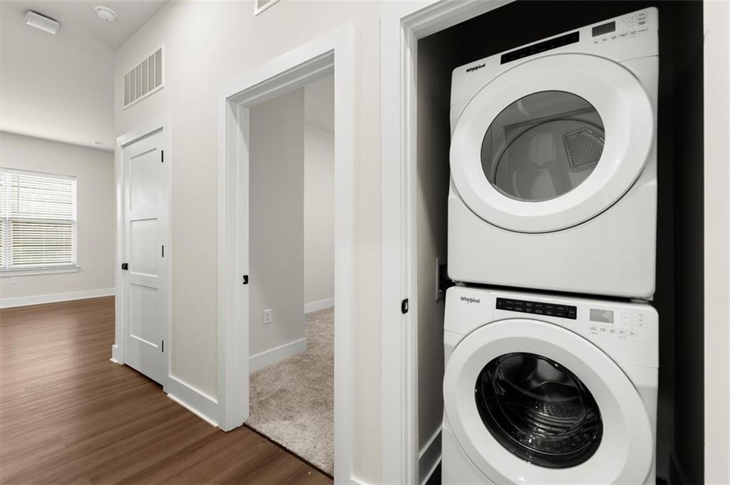 2648 Sandy Plains Road, Unit 301 Marietta, GA 30062 - Photo 28 of 46 a view of a hallway with washer and dryer