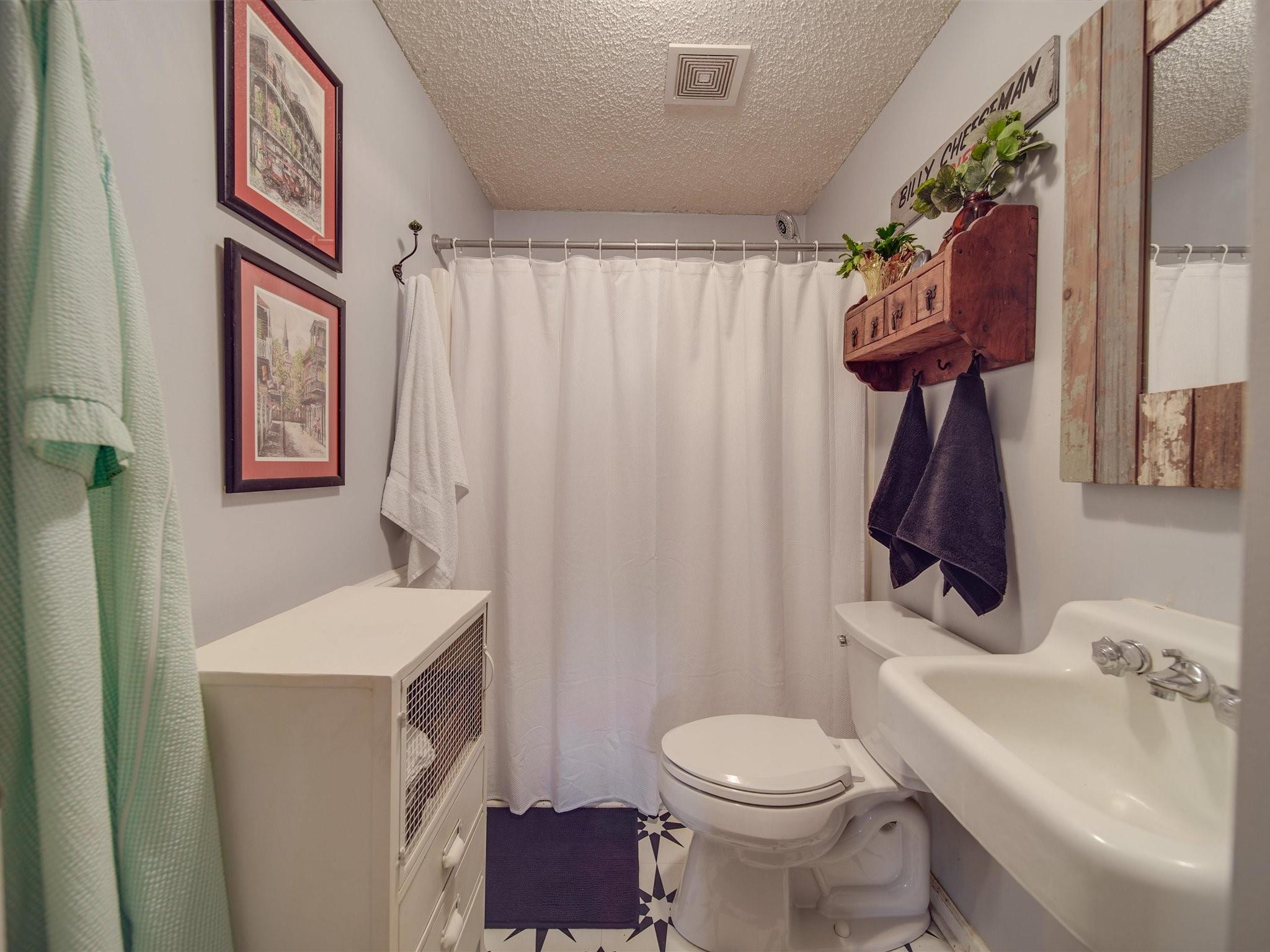 3410 Helms Pond Road Monroe, NC 28110 - Photo 15 of 35 a bathroom with a sink toilet and shower