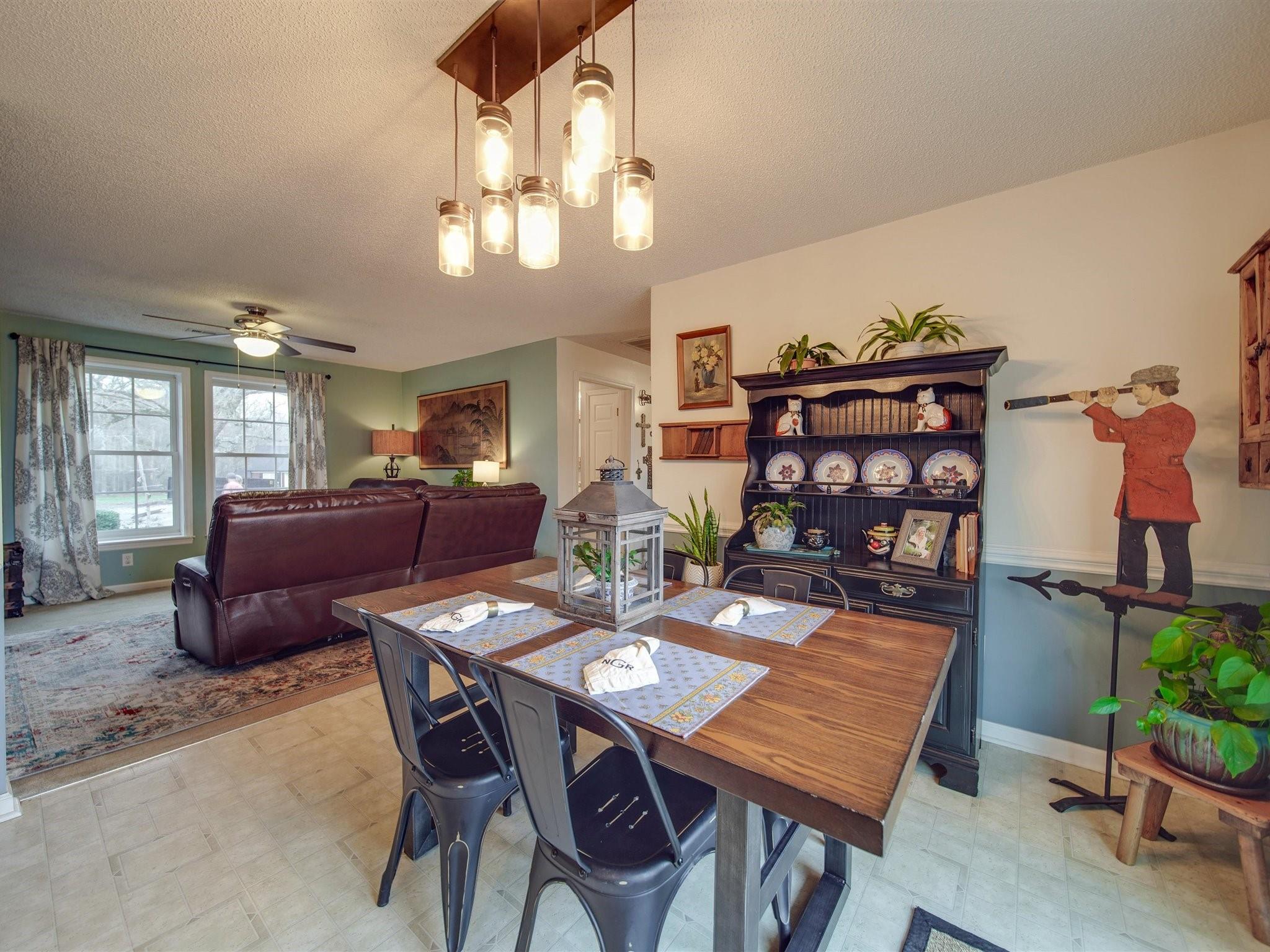 3410 Helms Pond Road Monroe, NC 28110 - Photo 16 of 35 a view of a dining room with furniture