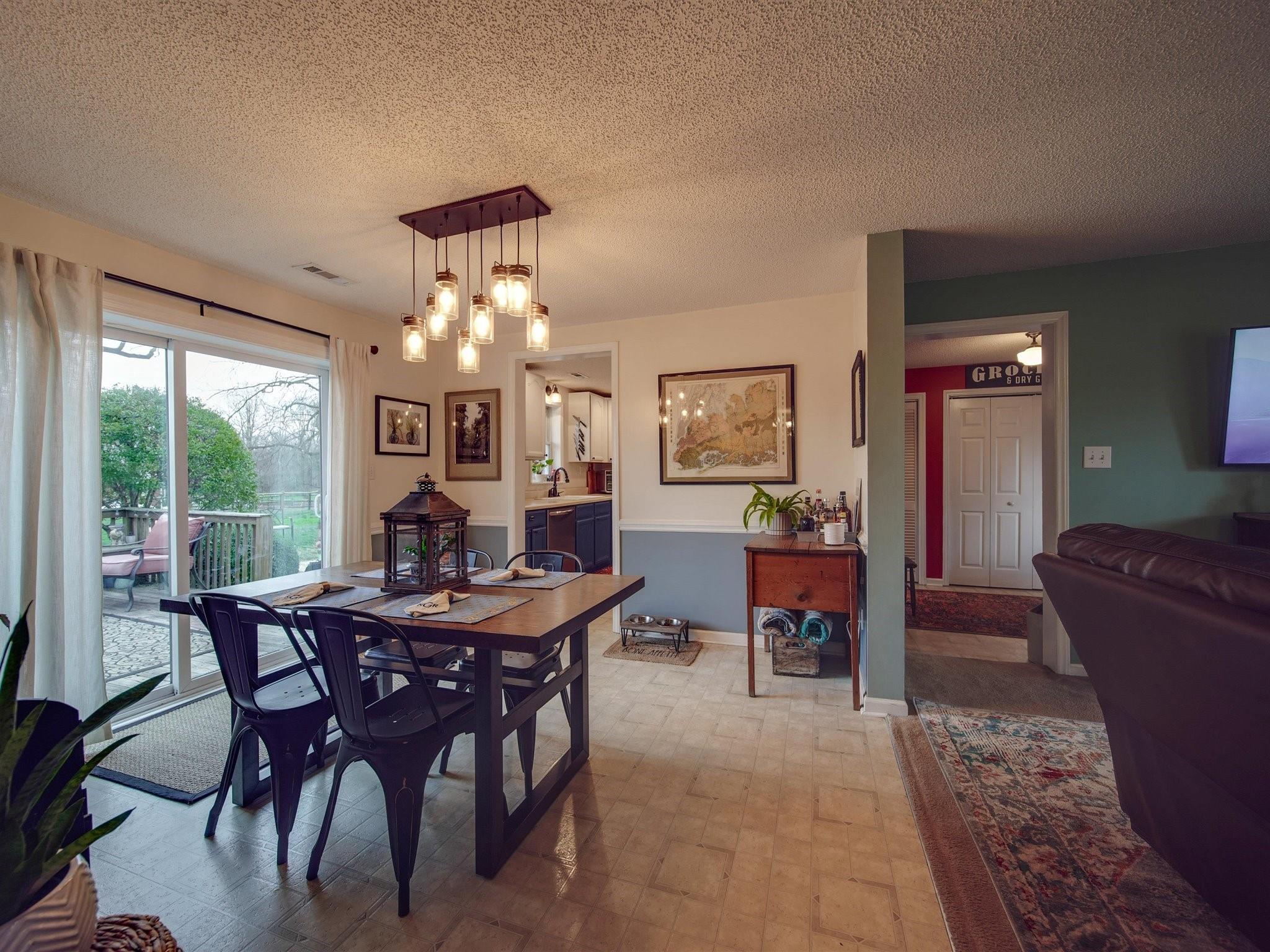 3410 Helms Pond Road Monroe, NC 28110 - Photo 17 of 35 a view of a dining room with furniture window and outside view