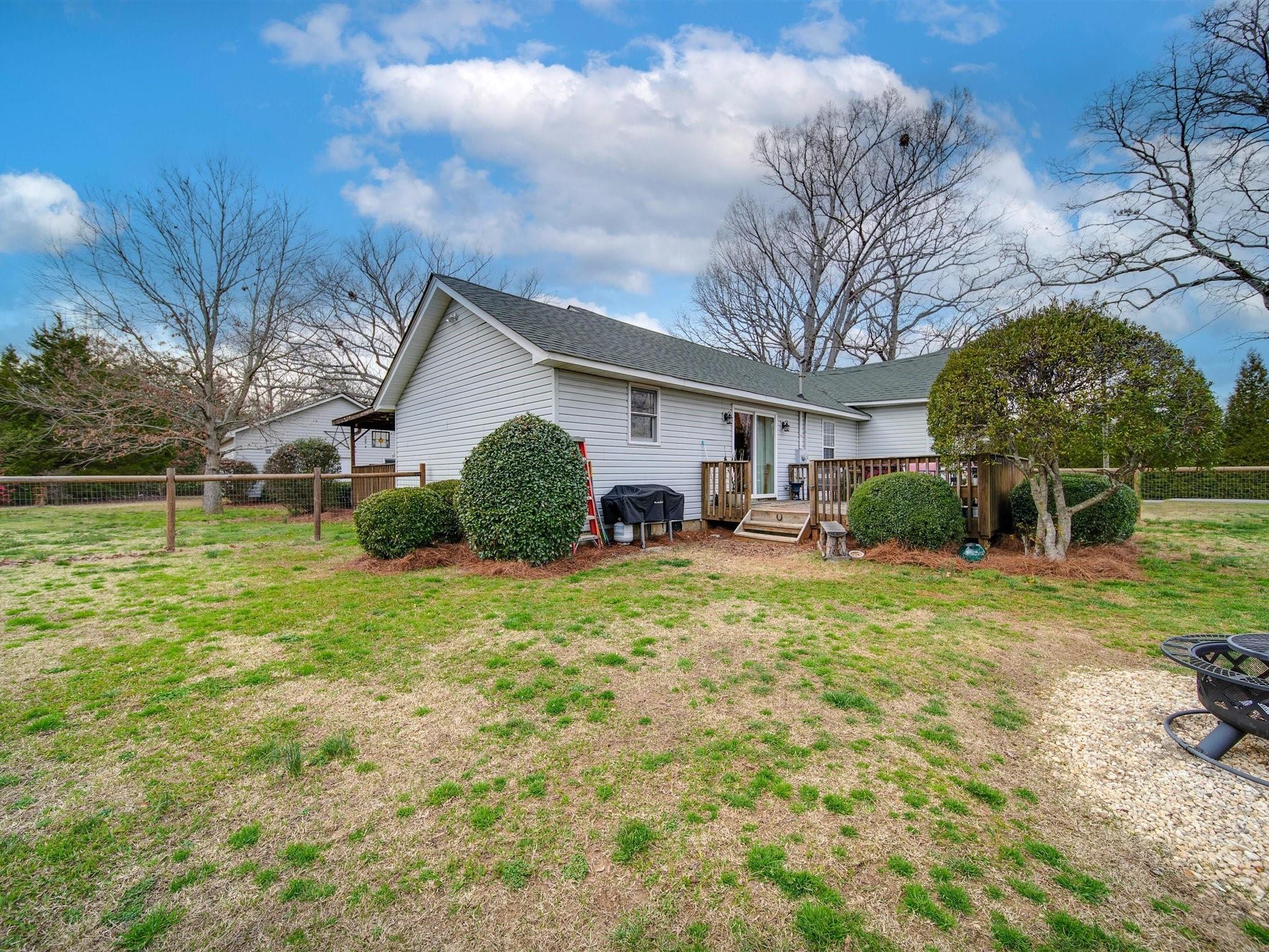 3410 Helms Pond Road Monroe, NC 28110 - Photo 2 of 35 a front view of a house with garden