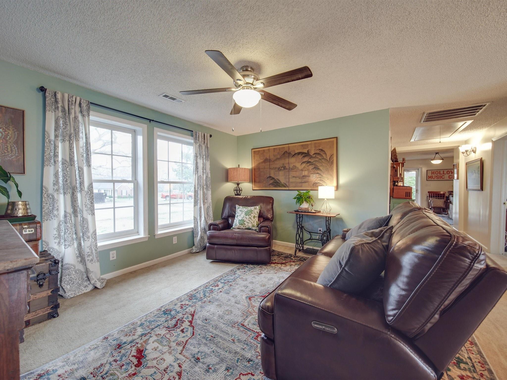 3410 Helms Pond Road Monroe, NC 28110 - Photo 27 of 35 a living room with furniture and a large window
