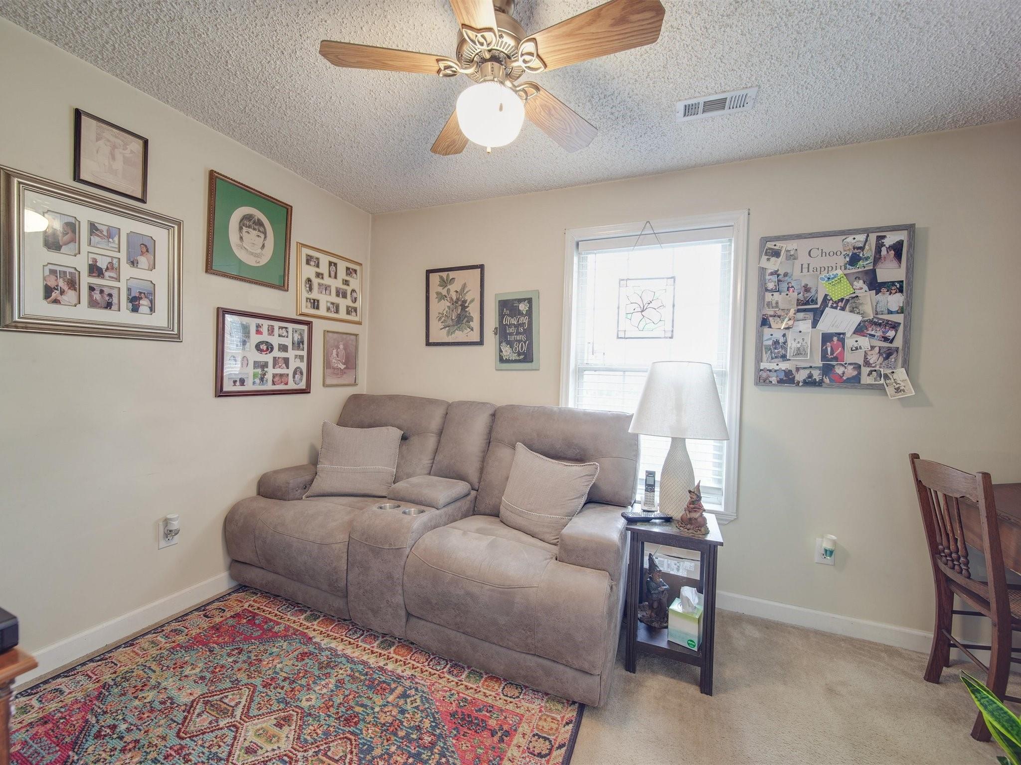 3410 Helms Pond Road Monroe, NC 28110 - Photo 29 of 35 a living room with furniture and a window
