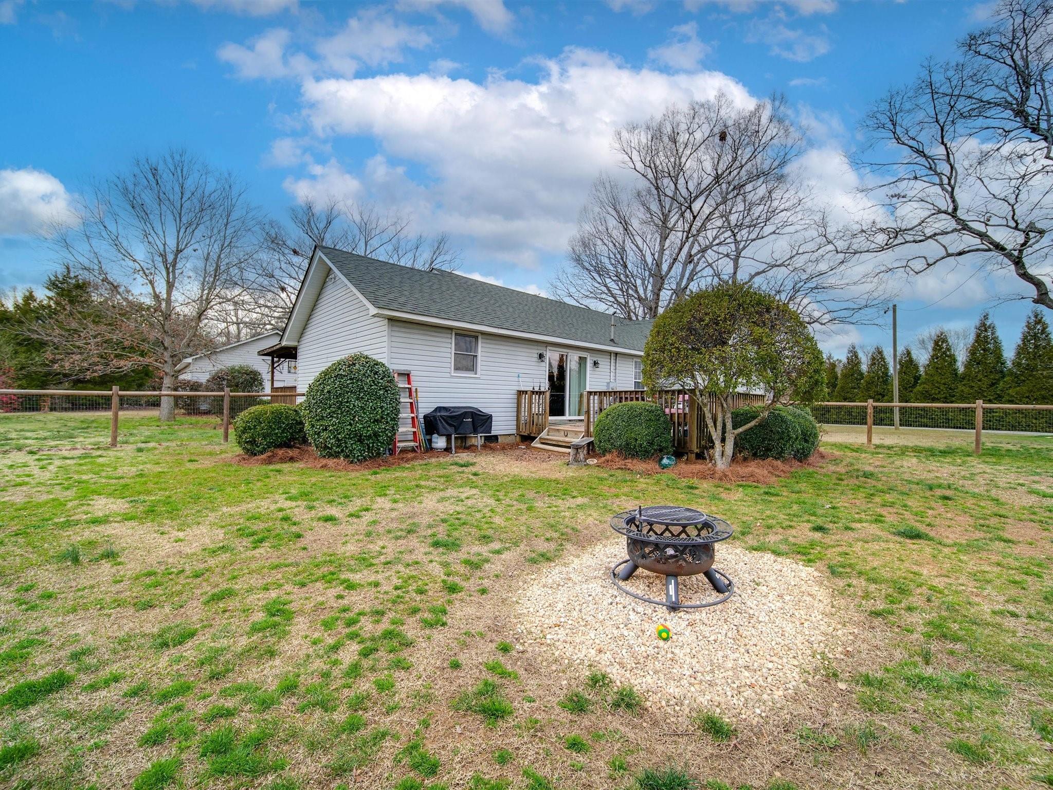 3410 Helms Pond Road Monroe, NC 28110 - Photo 5 of 35 a house view with a garden space