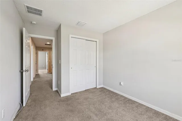 a view of a room with a hallway