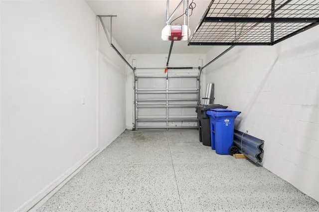 a view of an empty room with stairs