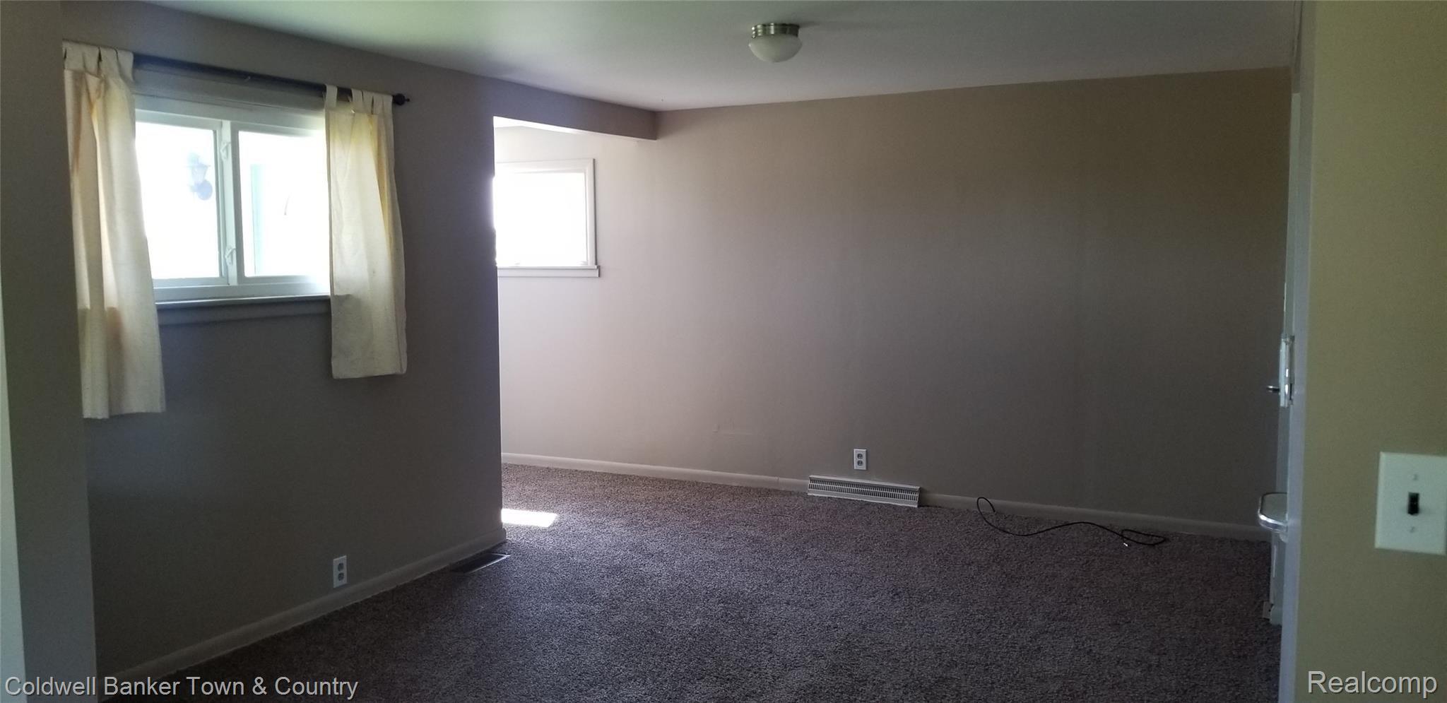 9480 Judd Road Fowlerville, MI 48836 - Photo 5 of 5 New carpet lower level