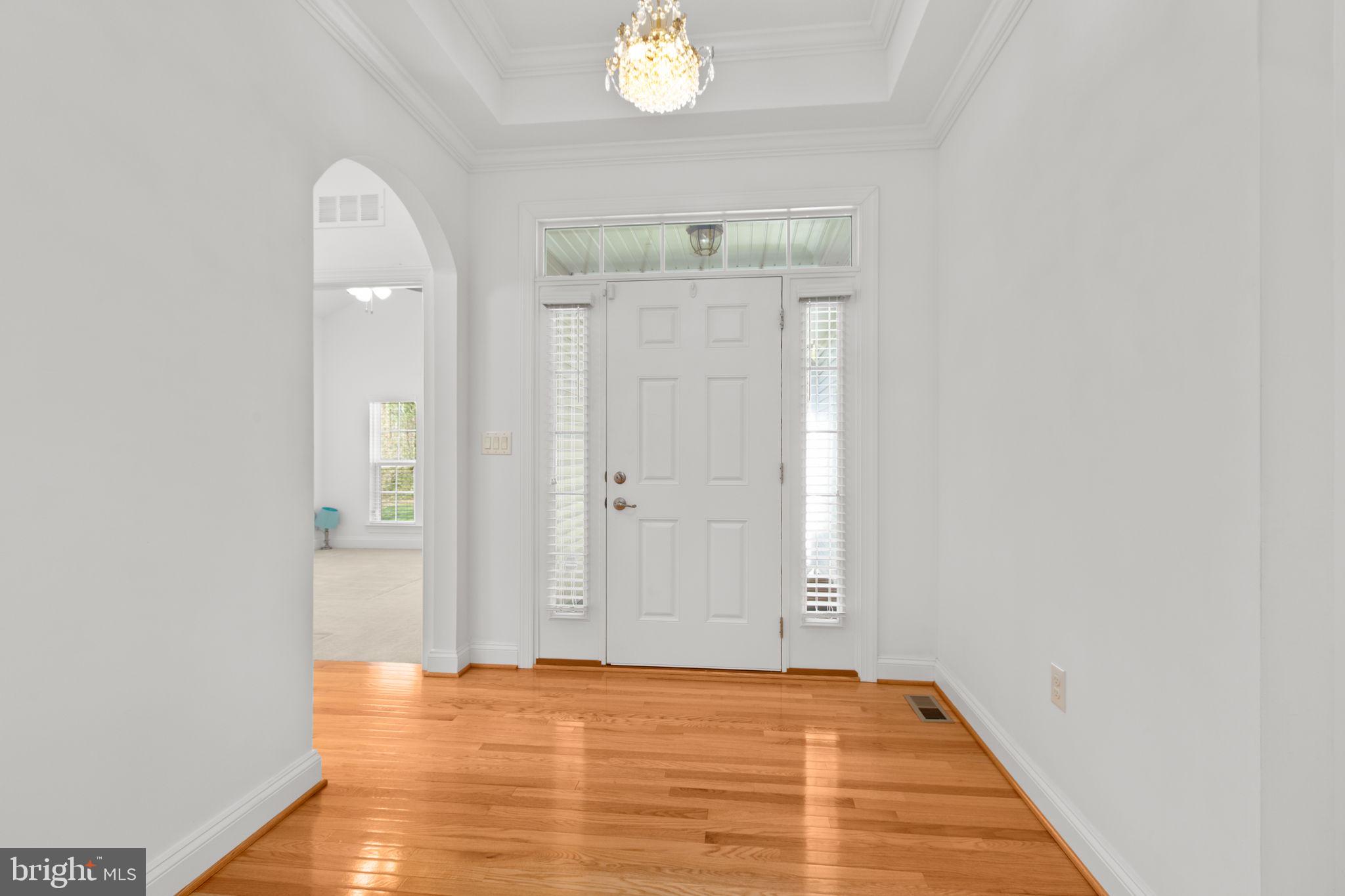 400 Telegraph Road Stafford, VA 22554 - Photo 25 of 79 a view of an empty room with wooden floor and a window